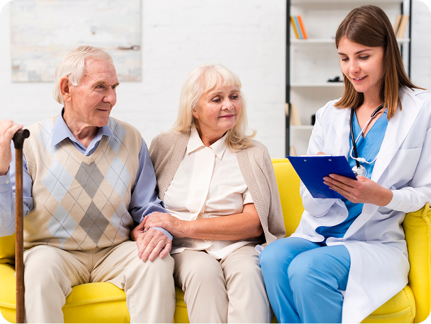 Doctor showing chart updates to elderly senior couple
