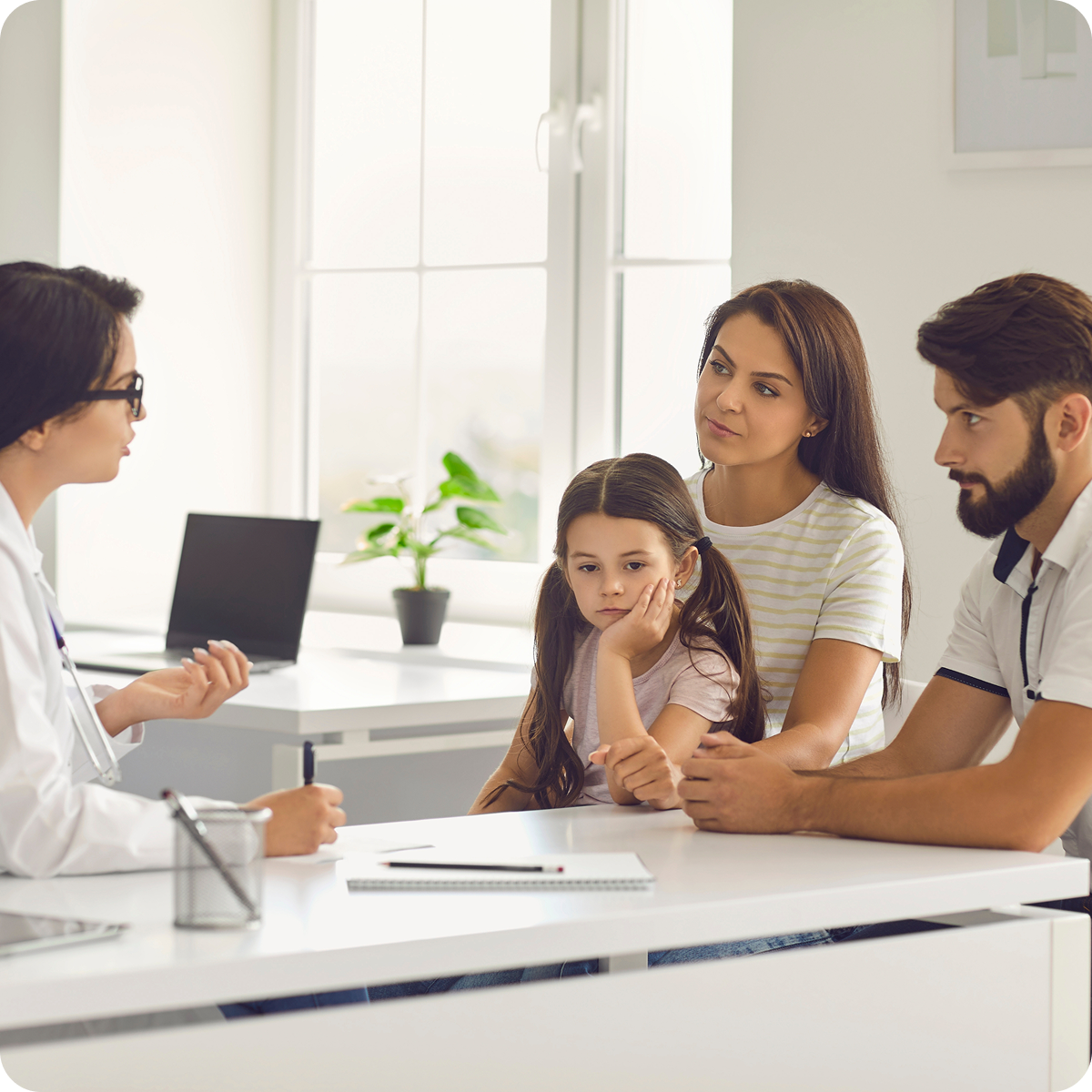 Doctor consulting with a family